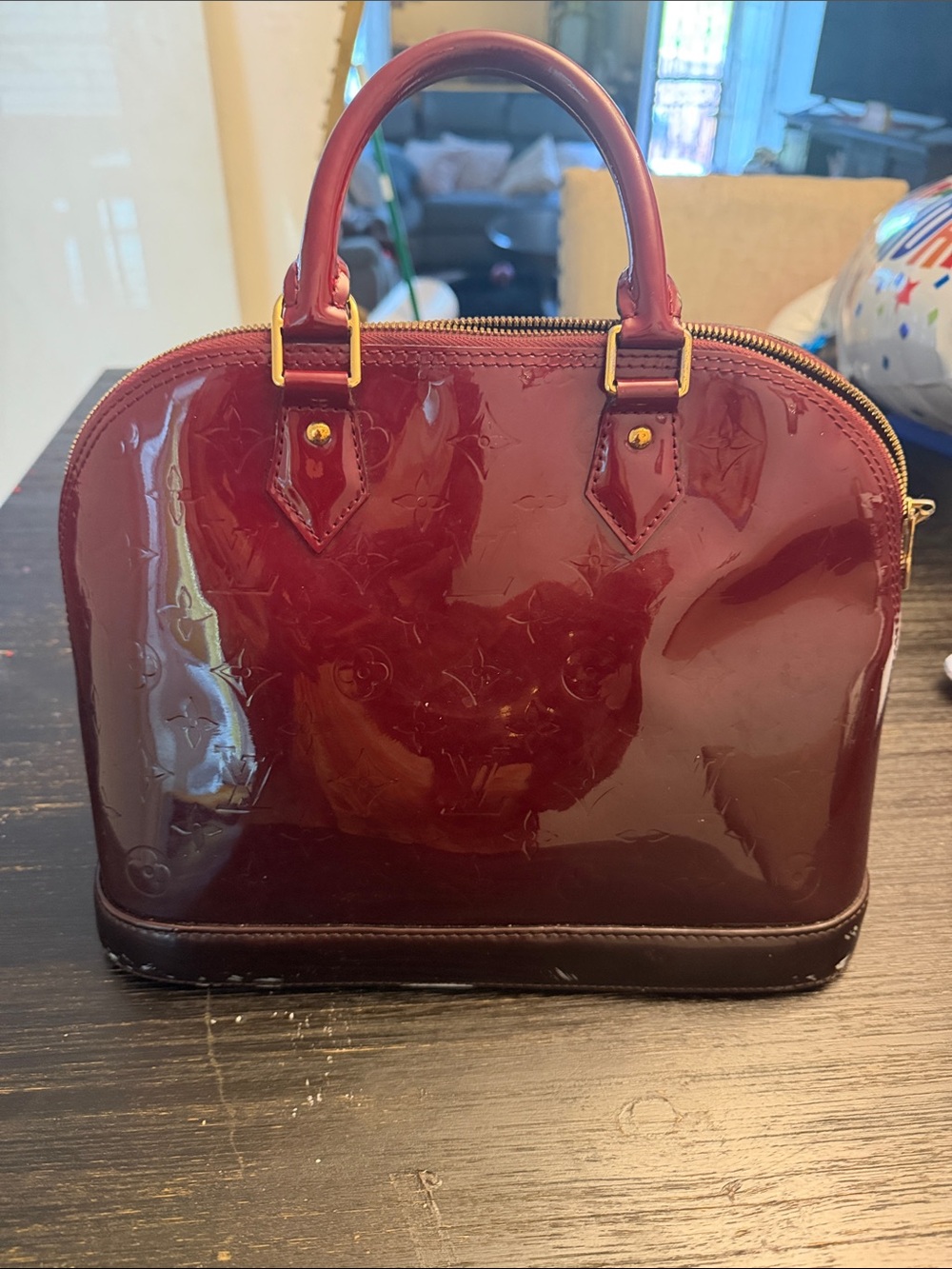 Louis Vuitton Burgundy Leather purse with Gold Hardware